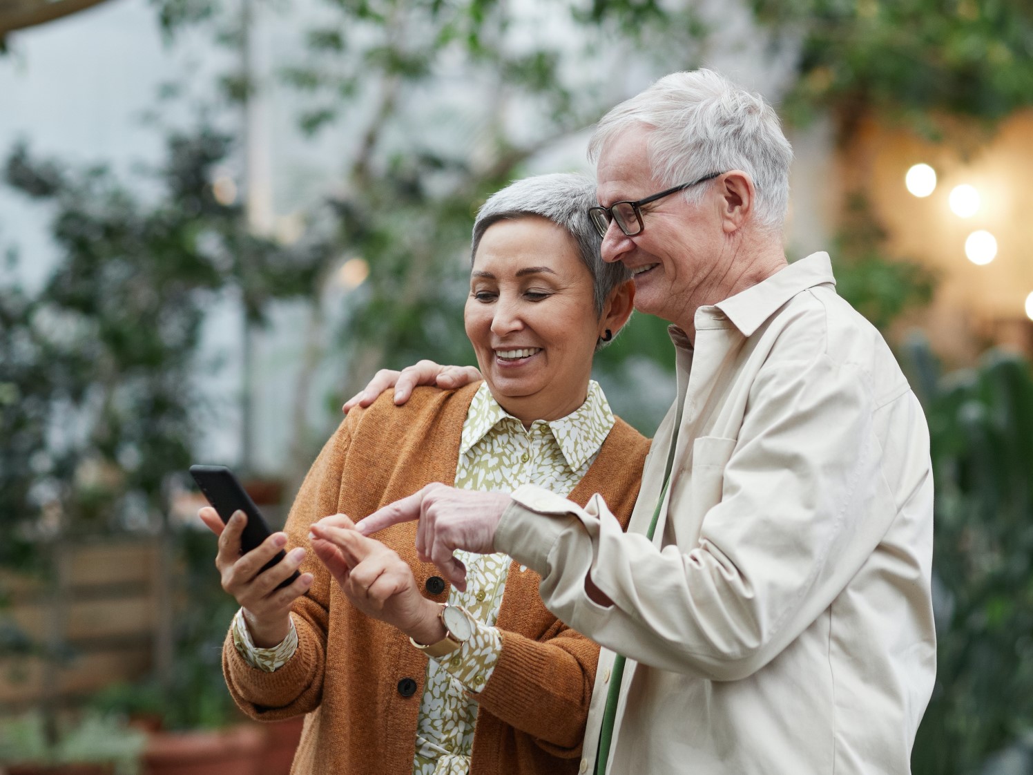 Two senior women using a smartphone