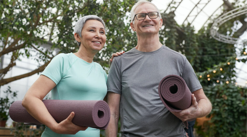 senior couple doing yoga